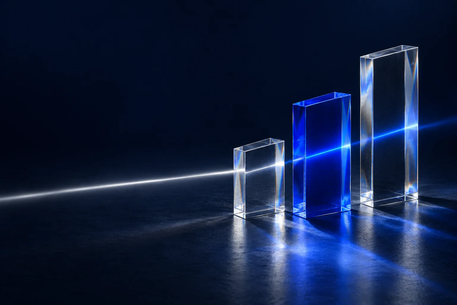 Blue glass columns bringing a beam of light into focus